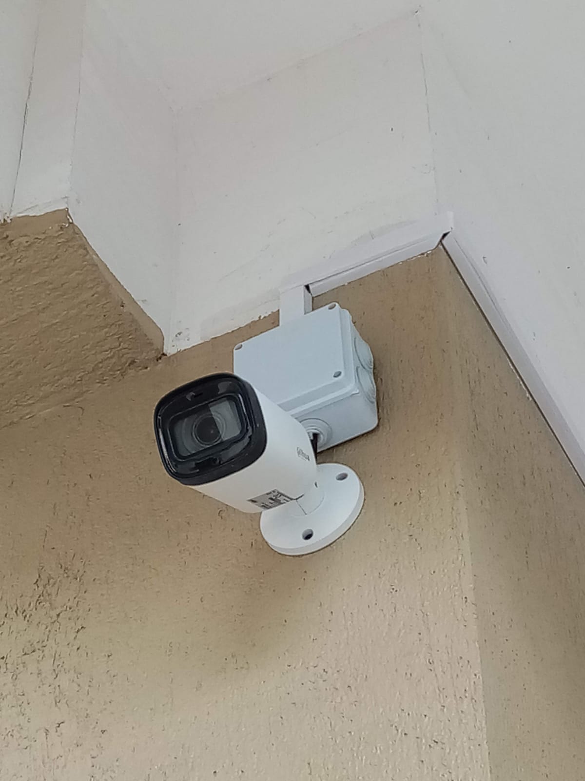 Dahua bullet CCTV camera mounted in a corner eave position covering an approach at a Limuru apartment complex