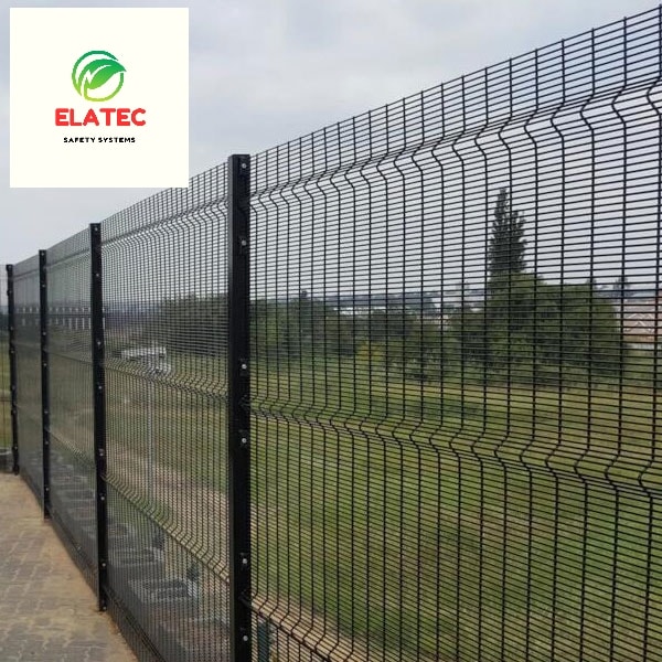 358 anti-climb welded mesh clear view fence panels on powder-coated steel posts along a Karen property boundary, open grounds visible beyond
