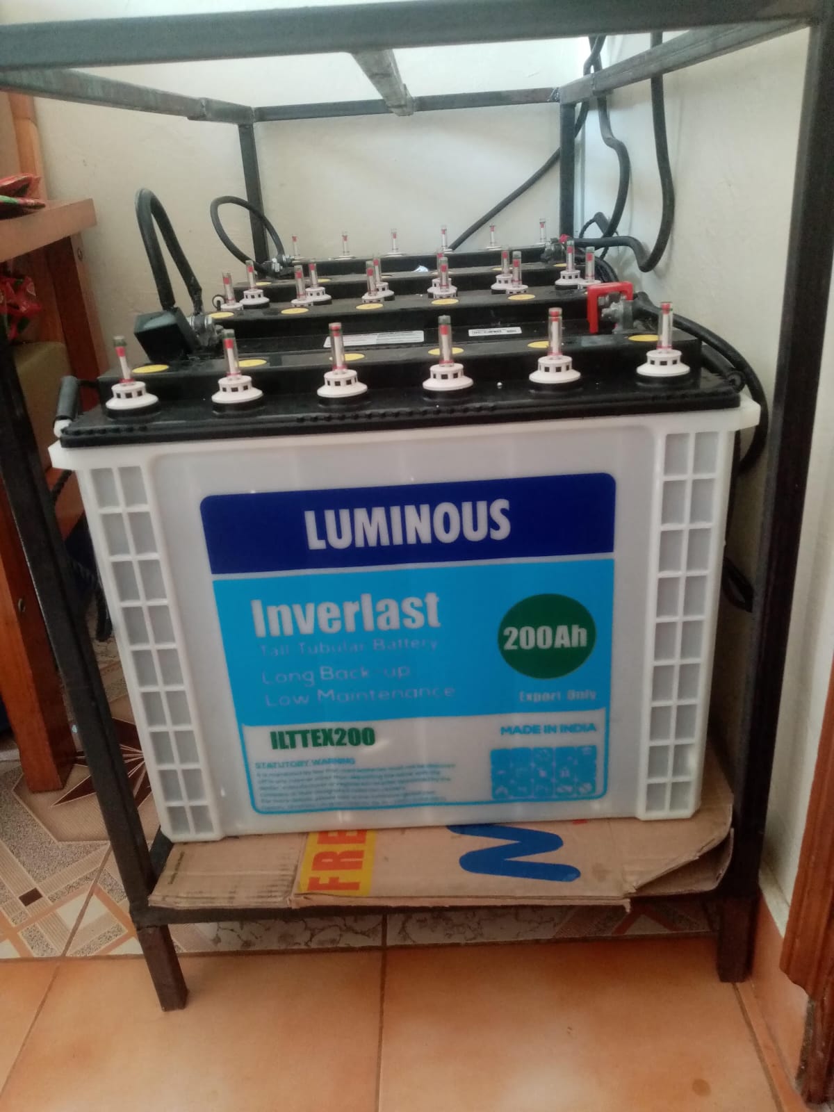 Luminous Inverlast 200Ah tubular battery bank installed on a steel rack in a Kiambu home for solar backup power