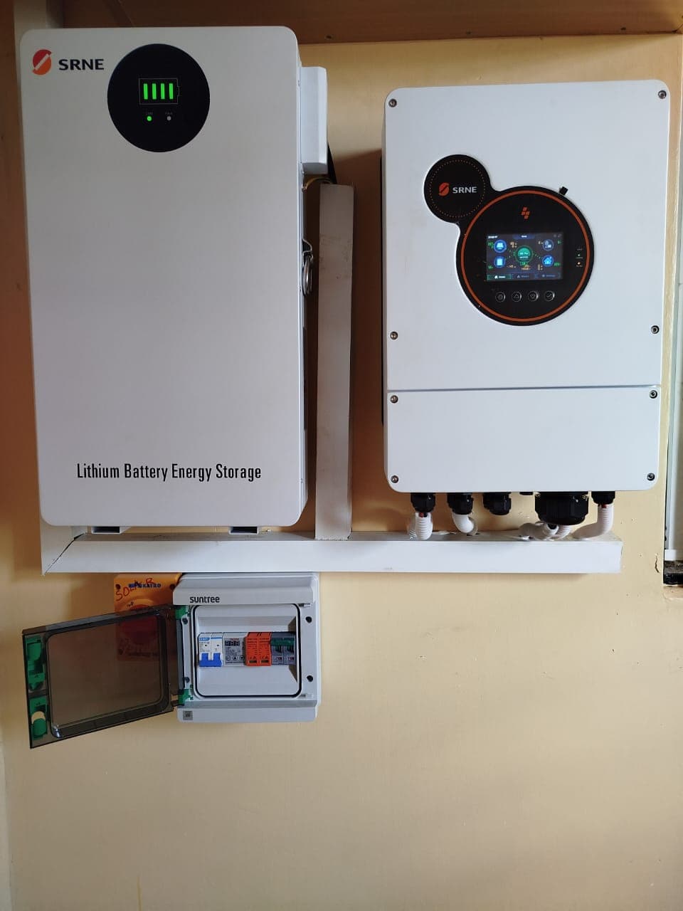SRNE lithium battery energy storage unit and hybrid inverter wall-mounted at a home in Mumias