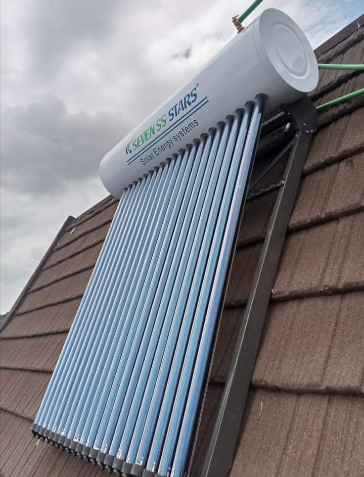 200L Seven SS Stars evacuated-tube solar water heater mounted on a tiled roof in Nairobi, angled view showing the full collector tube array
