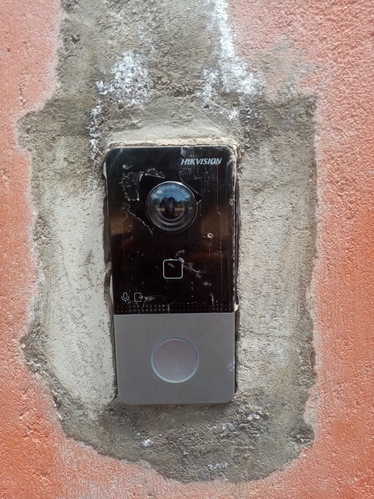 Hikvision outdoor video intercom door station mounted into a recessed wall fitting at a Karen property
